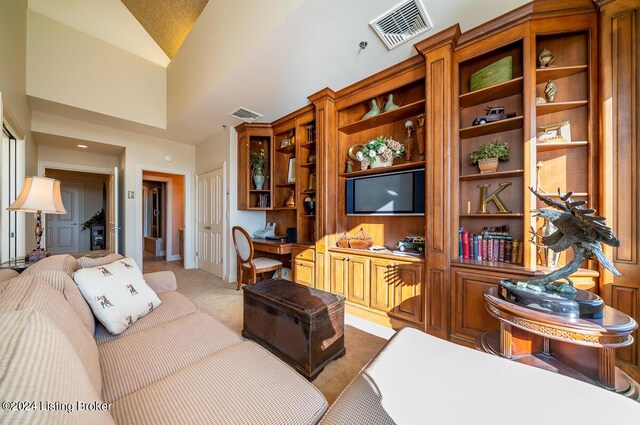 1 Riverpointe Plz Unit 1112, Jeffersonville, IN 47130 - living room featuring light carpet and high vaulted ceiling
