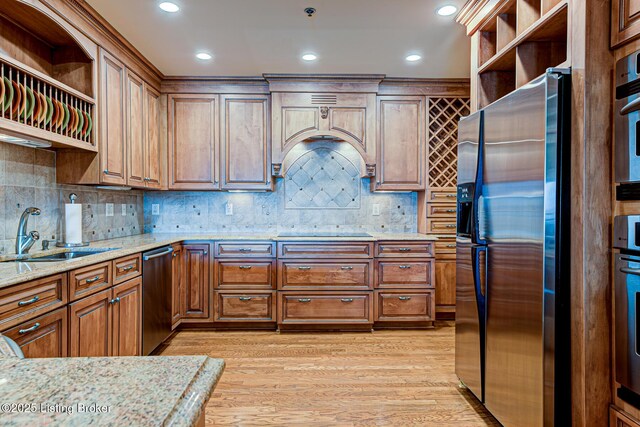1 Riverpointe Plz Unit 1112, Jeffersonville, IN 47130 - kitchen with stainless steel appliances, open shelves, a sink, light wood-style floors, and recessed lighting