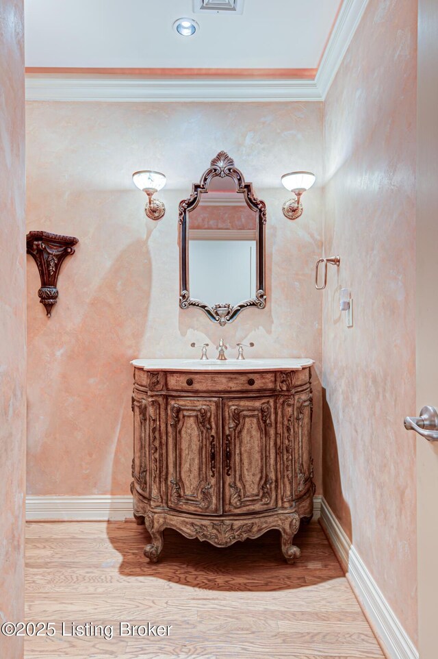 1 Riverpointe Plz Unit 1112, Jeffersonville, IN 47130 - bathroom with vanity, ornamental molding, wood finished floors, and recessed lighting