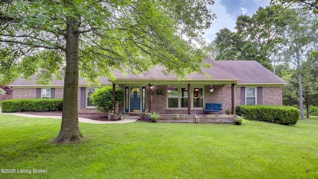 1625 Tina Ct, La Grange, KY 40031 - single story home with a front yard, brick siding, covered porch, and roof with shingles