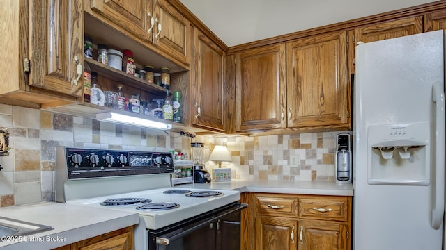 1625 Tina Ct, La Grange, KY 40031 - kitchen featuring white appliances, light countertops, tasteful backsplash, and brown cabinets