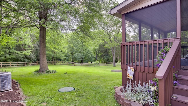 1625 Tina Ct, La Grange, KY 40031 - view of yard featuring central AC, a sunroom, a wooden deck, and a view of trees