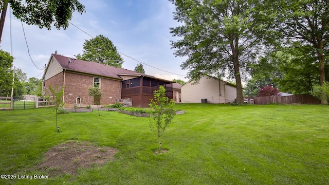 1625 Tina Ct, La Grange, KY 40031 - view of yard with a sunroom and a deck