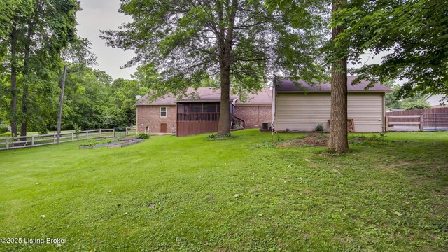1625 Tina Ct, La Grange, KY 40031 - view of yard featuring a garden, a sunroom, and central AC unit