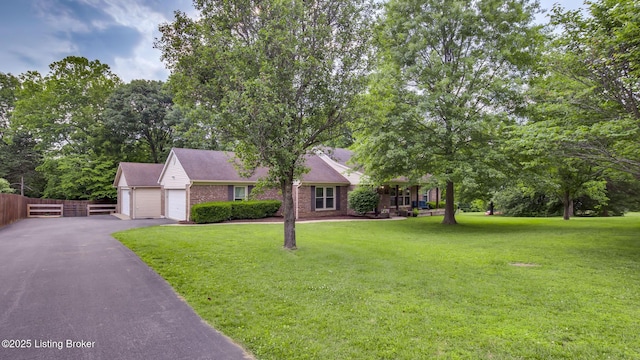 1625 Tina Ct, La Grange, KY 40031 - view of front of property with brick siding and a detached garage