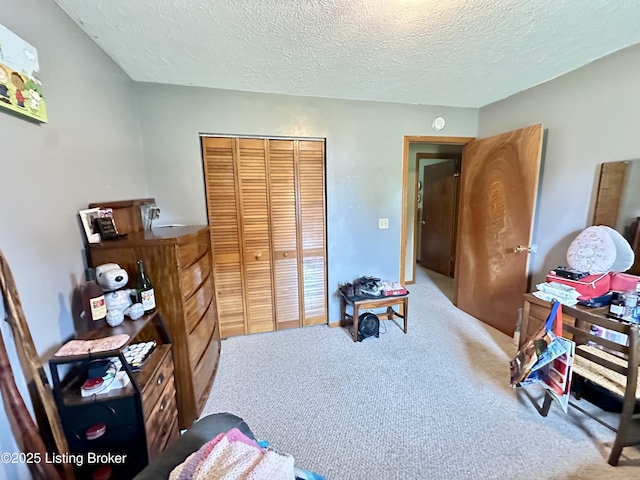 186 Lillian Ave, Elizabethtown, KY 42701 - carpeted bedroom with a closet and a textured ceiling