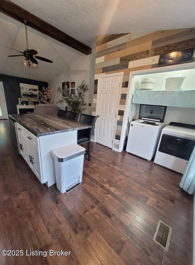 3007 Cline Ct, Carrollton, KY 41008 - kitchen with dark wood-type flooring, washer and clothes dryer, white cabinetry, a ceiling fan, and a textured ceiling