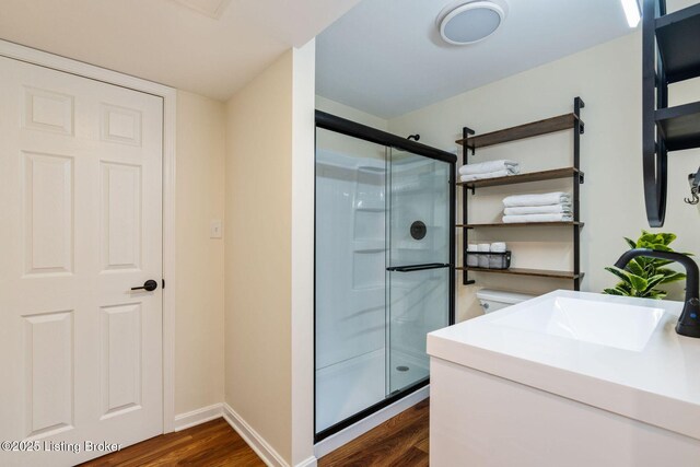 4002 Rock Bay Dr, Louisville, KY 40245 - full bathroom featuring wood finished floors, a shower stall, and vanity