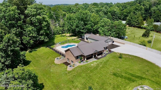 2004 Kepley Rd, Georgetown, IN 47122 - aerial view of property and surrounding area featuring a pool area and a heavily wooded area