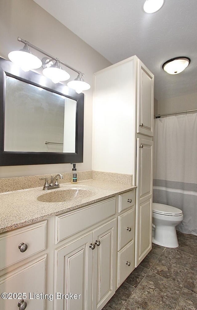 2004 Kepley Rd, Georgetown, IN 47122 - bathroom with vanity, toilet, and curtained shower