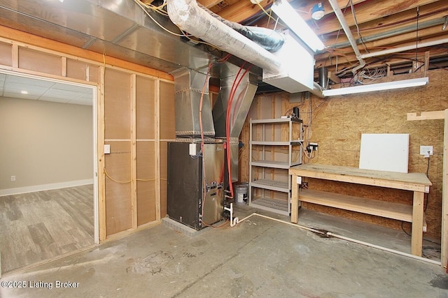 2004 Kepley Rd, Georgetown, IN 47122 - unfinished basement featuring heating unit and baseboards