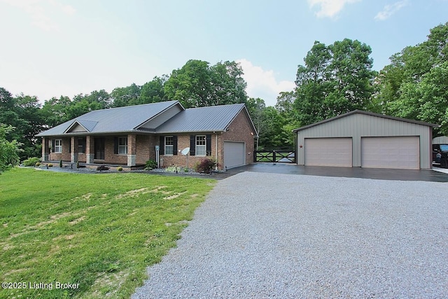 2004 Kepley Rd, Georgetown, IN 47122 - ranch-style house with a garage, a front lawn, a porch, brick siding, and metal roof