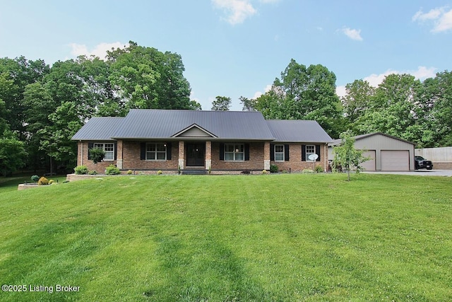 2004 Kepley Rd, Georgetown, IN 47122 - ranch-style house with a garage, an outbuilding, a front lawn, covered porch, and metal roof