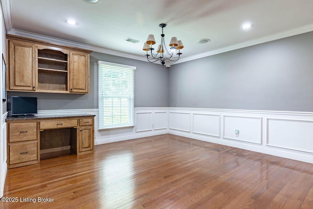 766 Pottershop Rd, Bardstown, KY 40004 - unfurnished office with a chandelier, crown molding, built in study area, wood finished floors, and a wainscoted wall