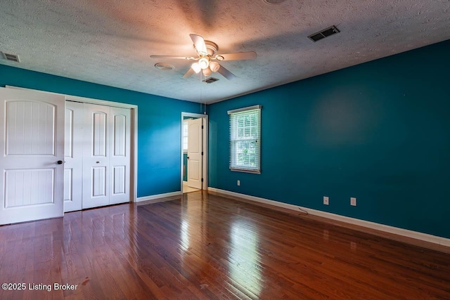 766 Pottershop Rd, Bardstown, KY 40004 - unfurnished bedroom with a textured ceiling, wood finished floors, a closet, and a ceiling fan