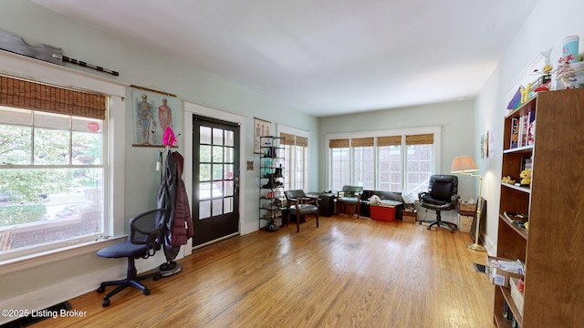 1344 S Brook St, Louisville, KY 40208 - living area with wood finished floors and baseboards
