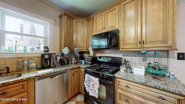 1344 S Brook St, Louisville, KY 40208 - kitchen featuring black appliances, decorative backsplash, a sink, and light stone counters