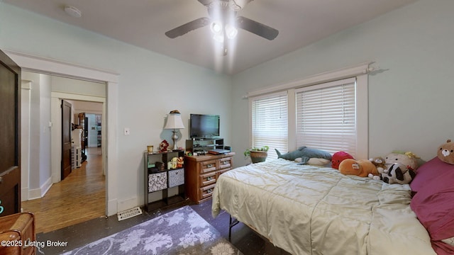 1344 S Brook St, Louisville, KY 40208 - bedroom with baseboards, wood finished floors, and ceiling fan