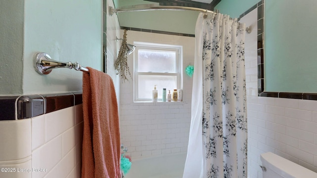 1344 S Brook St, Louisville, KY 40208 - full bath with toilet, shower / bath combo with shower curtain, and tile walls