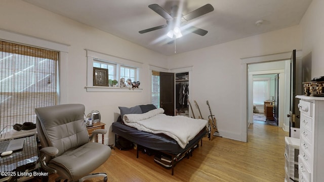 1344 S Brook St, Louisville, KY 40208 - bedroom with light wood-type flooring, a closet, a ceiling fan, and baseboards