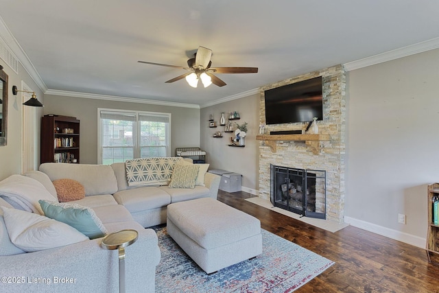 1007 Girard Dr, Louisville, KY 40222 - living area featuring ceiling fan, crown molding, wood finished floors, a stone fireplace, and baseboards