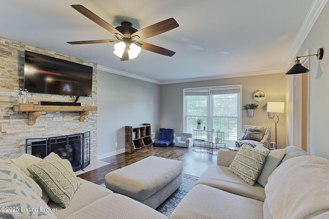 1007 Girard Dr, Louisville, KY 40222 - living room featuring wood finished floors, crown molding, a ceiling fan, a stone fireplace, and baseboards