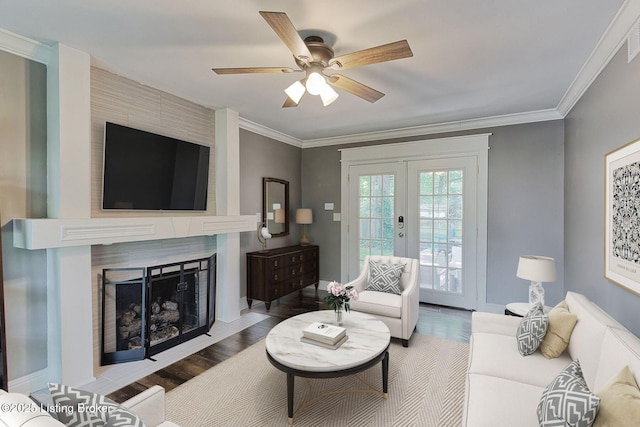1007 Girard Dr, Louisville, KY 40222 - living area with french doors, wood finished floors, a ceiling fan, a fireplace, and baseboards