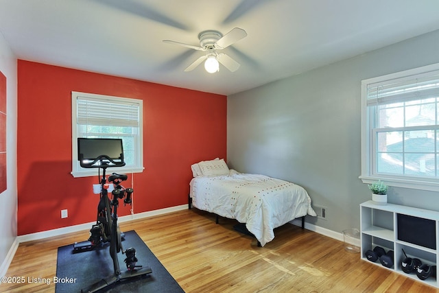 1007 Girard Dr, Louisville, KY 40222 - bedroom with light wood finished floors, baseboards, and a ceiling fan