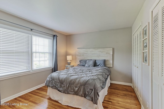 1007 Girard Dr, Louisville, KY 40222 - bedroom with wood finished floors and baseboards