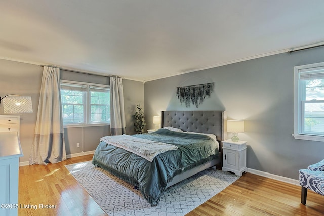 1007 Girard Dr, Louisville, KY 40222 - bedroom with light wood finished floors, crown molding, and baseboards