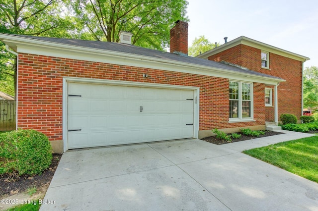 1007 Girard Dr, Louisville, KY 40222 - view of front facade featuring concrete driveway, brick siding, a garage, and a chimney