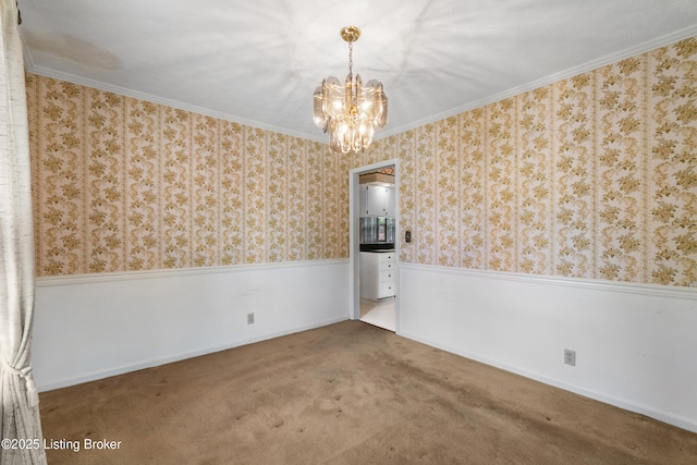 7509 Appletree Way, Louisville, KY 40228 - empty room featuring a wainscoted wall, a chandelier, wallpapered walls, carpet flooring, and ornamental molding