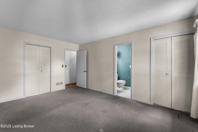 7509 Appletree Way, Louisville, KY 40228 - unfurnished bedroom with carpet floors, ensuite bath, and two closets
