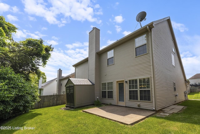8811 Eli Dr, Louisville, KY 40291 - rear view of house with a chimney and a patio