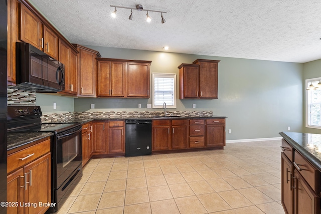 8811 Eli Dr, Louisville, KY 40291 - kitchen featuring black appliances, a sink, light tile patterned flooring, a textured ceiling, and baseboards