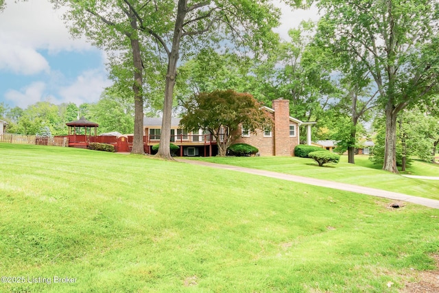 2508 Windsor Forest Dr, Louisville, KY 40272 - view of front facade with a gazebo, a chimney, and a wooden deck