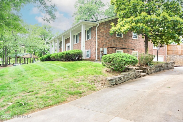 2508 Windsor Forest Dr, Louisville, KY 40272 - view of property exterior featuring a gazebo, brick siding, and a lawn