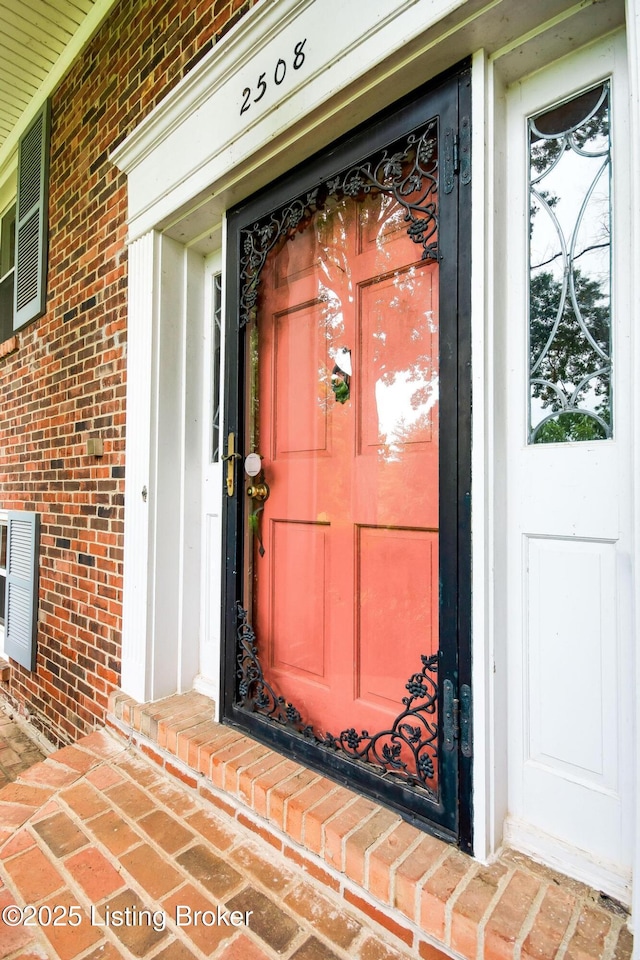 2508 Windsor Forest Dr, Louisville, KY 40272 - entrance to property with brick siding and a porch