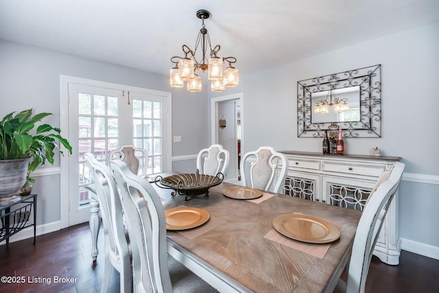 2508 Windsor Forest Dr, Louisville, KY 40272 - dining area with a chandelier, wood finished floors, and baseboards