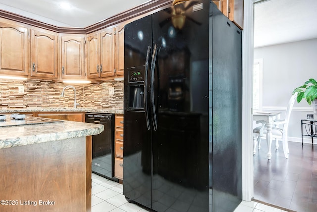 2508 Windsor Forest Dr, Louisville, KY 40272 - kitchen with black appliances, decorative backsplash, and light tile patterned flooring