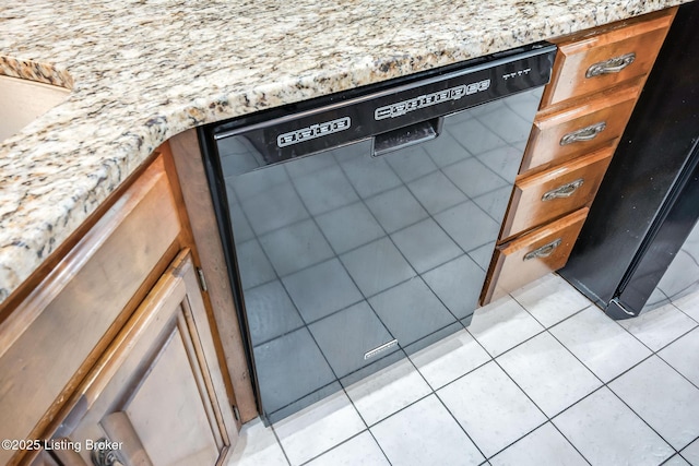 2508 Windsor Forest Dr, Louisville, KY 40272 - kitchen view of black dishwasher, brown cabinetry, and light stone counters