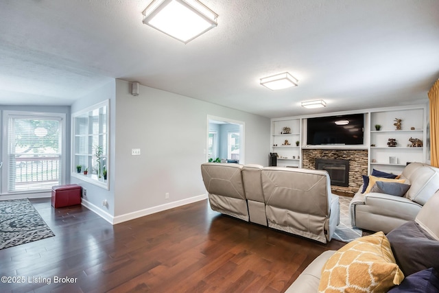 2508 Windsor Forest Dr, Louisville, KY 40272 - living area with baseboards, dark wood-style floors, a fireplace, and a textured ceiling