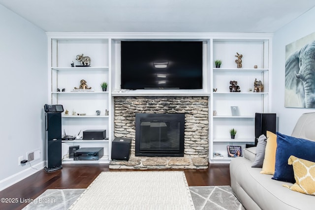 2508 Windsor Forest Dr, Louisville, KY 40272 - living area with wood finished floors, a stone fireplace, built in features, and baseboards