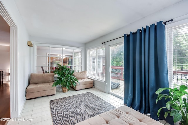 2508 Windsor Forest Dr, Louisville, KY 40272 - living room featuring light tile patterned flooring, plenty of natural light, and baseboards