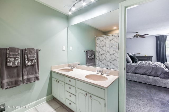 2508 Windsor Forest Dr, Louisville, KY 40272 - ensuite bathroom with double vanity, a ceiling fan, and tile patterned flooring