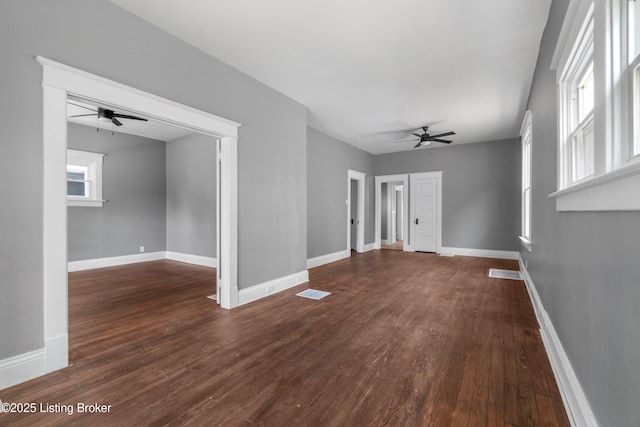 4015 S 5th St, Louisville, KY 40214 - spare room featuring a ceiling fan, dark wood finished floors, and baseboards