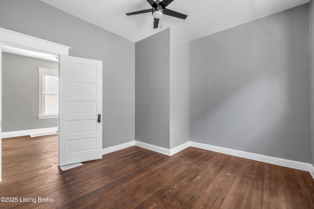 4015 S 5th St, Louisville, KY 40214 - empty room featuring ceiling fan, dark wood-style floors, baseboards, and lofted ceiling