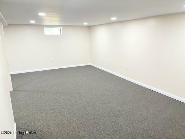 7402 Nottoway Cir, Louisville, KY 40214 - below grade area with recessed lighting and dark colored carpet