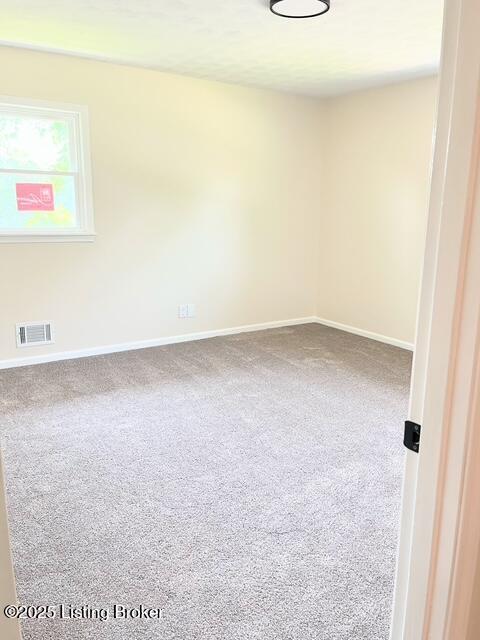 7402 Nottoway Cir, Louisville, KY 40214 - unfurnished room featuring carpet floors