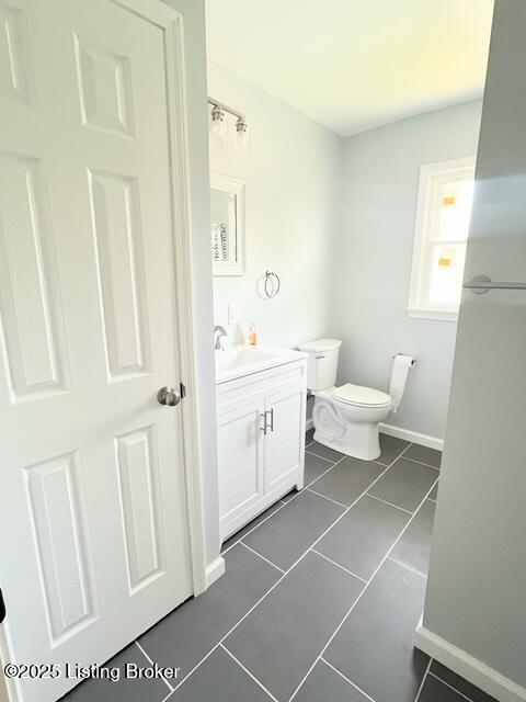 7402 Nottoway Cir, Louisville, KY 40214 - bathroom with vanity and tile patterned flooring